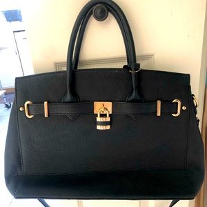 Black Dasein handbag with long big strap